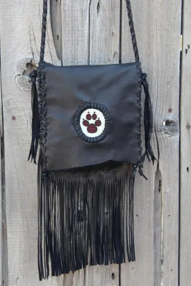 Black fringed handbag, beaded wolf paw design