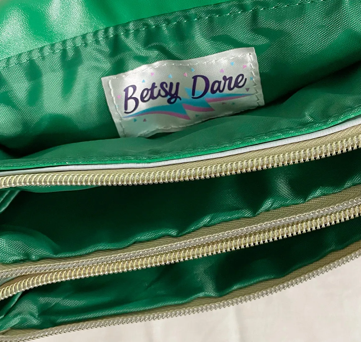 Lightning Bolt Romy Convertible Clutch in Electric Emerald