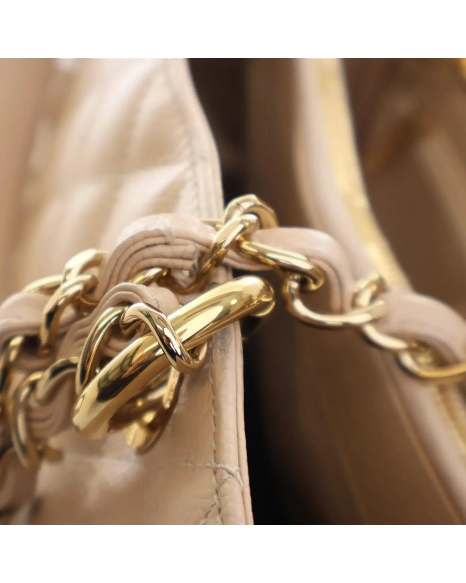 Quilted Leather Grand Shopping Tote with Chain Straps and Multiple Pockets